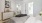 a bedroom with a bed and a table