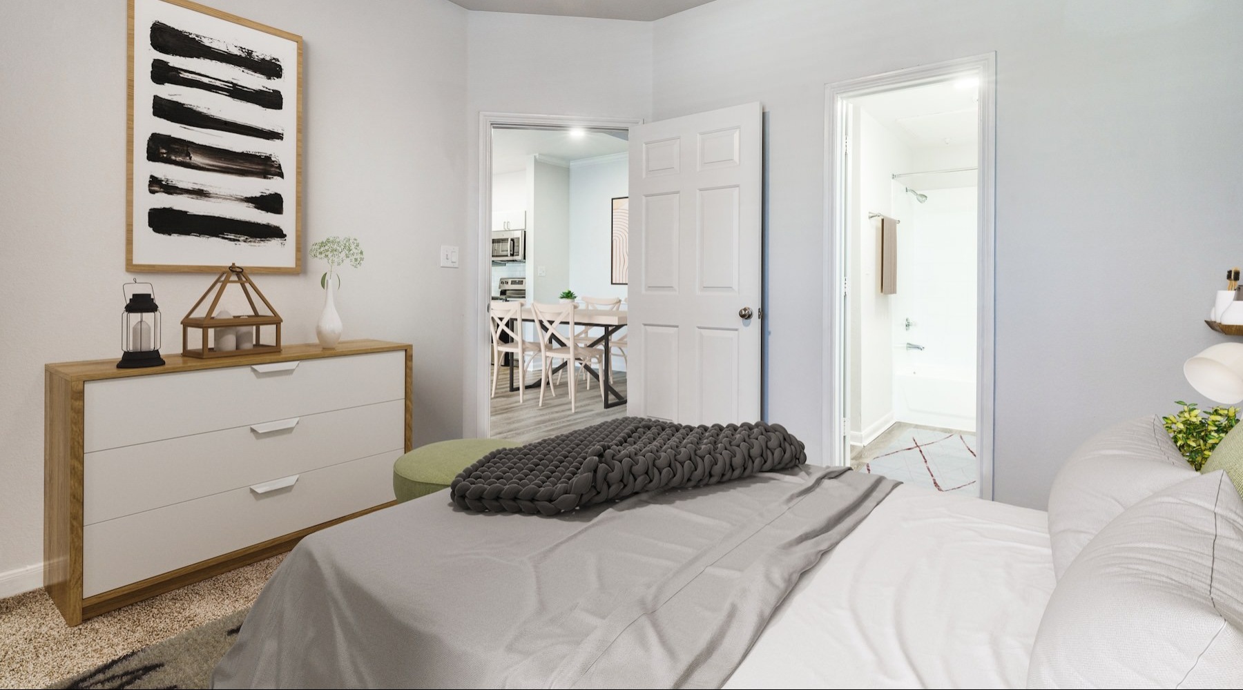 a bedroom with a bed and a dresser